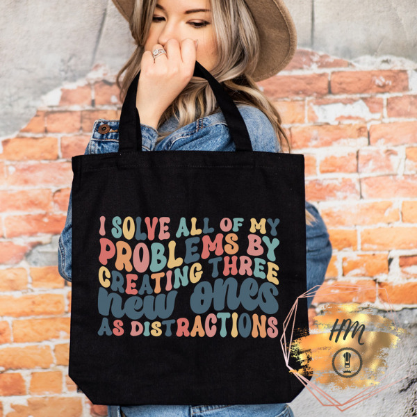 I solve all of my problems tote black