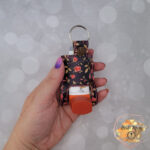 Brown floral vinyl asthma inhaler holder keychain