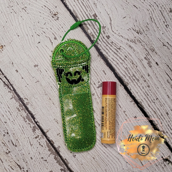 Halloween Pail Witch balm holder fob shown with lip balm