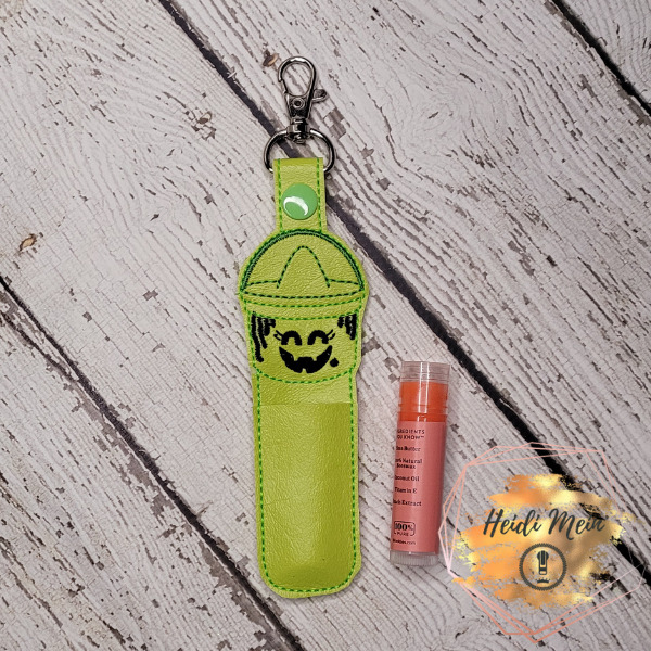Halloween Pail Witch balm holder snap tab shown with chapstick