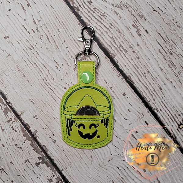 Halloween Pail Witch quarter keeper shown with quarter