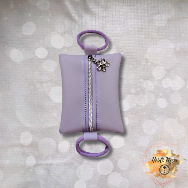 4.75×3.75 purple jelly tumbler bag with silver flower hardware