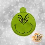 Embroidered Green Mischief Face Vinyl Ornament – Cute Holiday Tree Decoration & Funny Festive Gift Topper